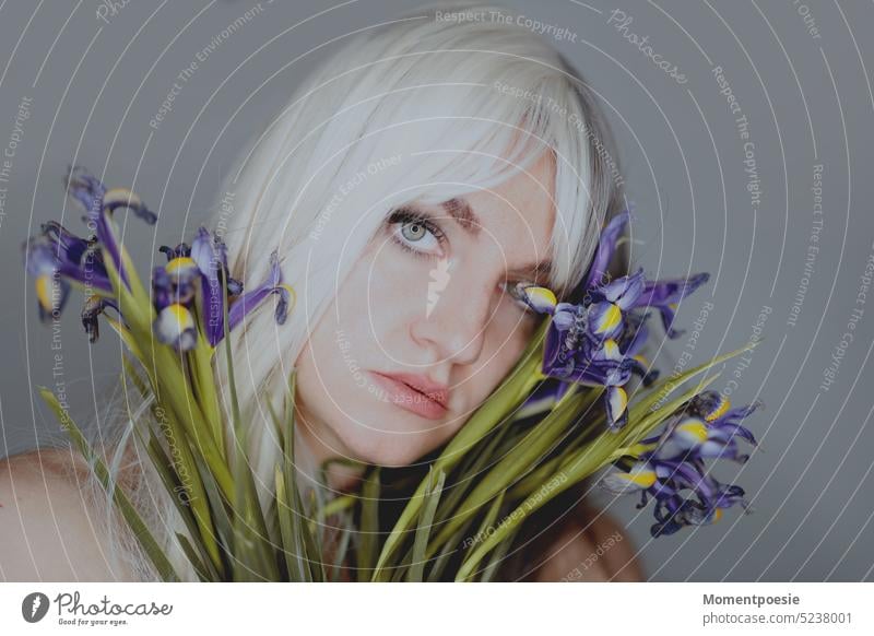 Woman with spring flowers Spring Flower portrait pretty blossom purple Spring flower Blossom Blonde White-haired Violet Model naturally spring feeling youthful