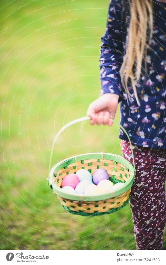Girl holds a basket of Easter eggs in her hands at Easter easter basket search Infancy Child amass colorful eggs Tradition egg hunt