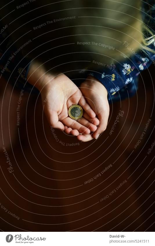 save for the future - child holds a euro in his hand Child Save Money Fear of the future euro coins Euro Coin Meditative Ambiguous Future Infancy Girl Hand
