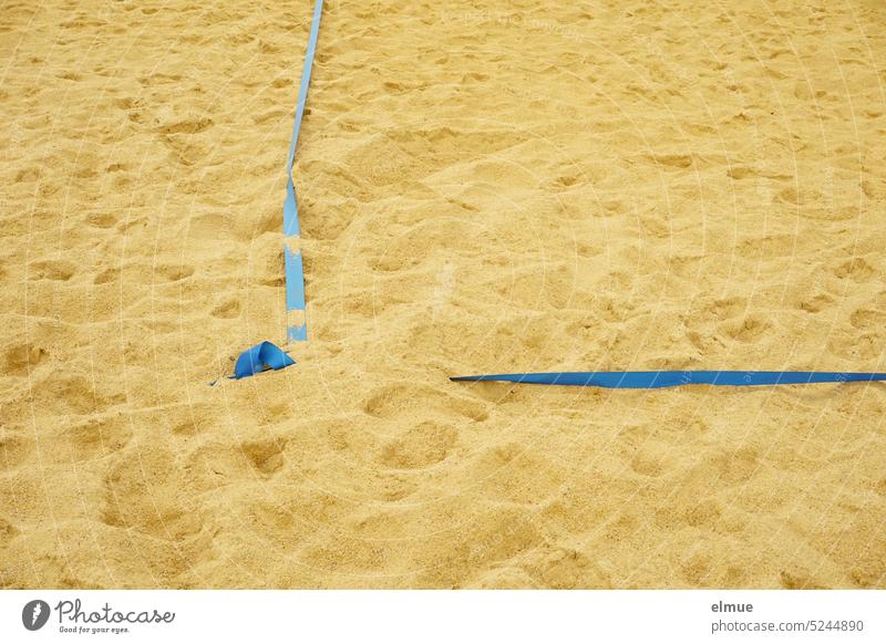 blue ribbon as delimitation of a playing field in the sand Sand demarcation beach volleyball Beach Volleyball Playing field sidelines Volleyball court Blog