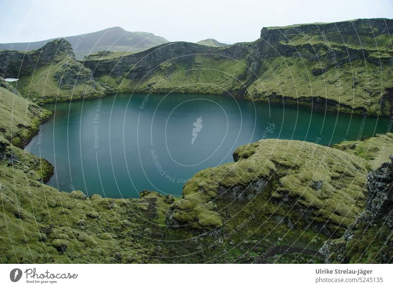 Iceland | calm crater lake near Askja volcano Volcanic crater volcanoes volcanism Volcano Nature mossy green Volcanic island Vulcanism volcanic landscape petrol
