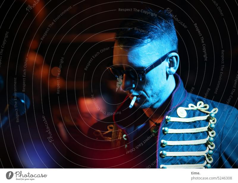 dressed guitarist with sunglasses and cigarette Man Short-haired Cigarette Smoking Jacket Costume Club atmosphere variegated Actor Floodlight Downward Masculine