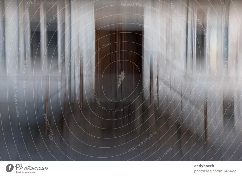 An old wooden entrance door of a house in motion blur abandoned abstract aged ancient architecture Art blurred building concept creepy dark dead death design