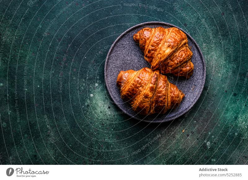 Fresh baked croissant with jam background concrete crunchy dessert eat eating food french meal napkin pastry plate sweet table delicious yummy tasty fresh