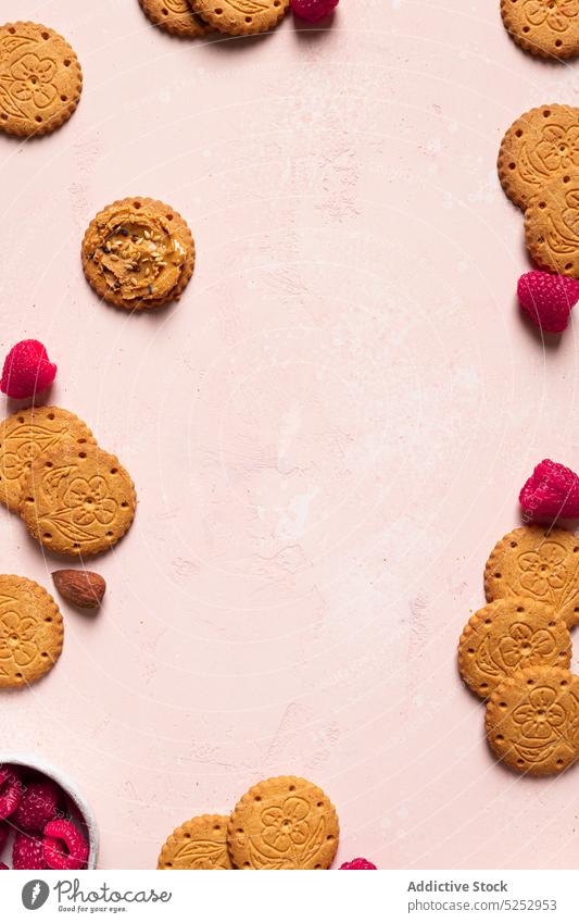 Delicious homemade cookies with raspberries nuts and peanut butter biscuit raspberry sweet delicious dessert background seed food crispy pastry nutrition crunch