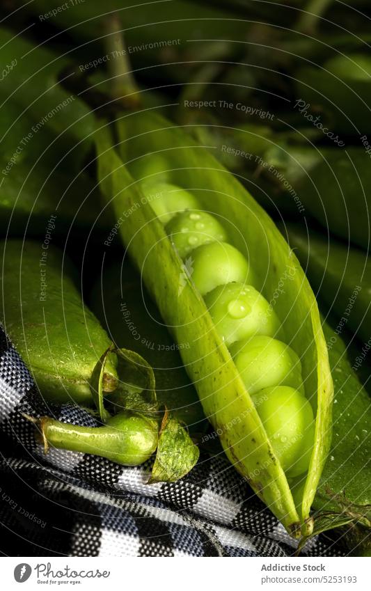 Fresh green pods with peas pile vegetarian harvest bunch ripe food heap organic fresh whole natural bean agriculture product vegan nutrient stack similar