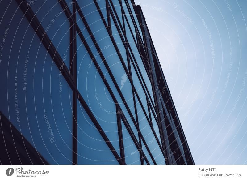 Glass facade of a modern office building Glas facade Architecture Building Sky Modern Structures and shapes Office building Worm's-eye view Blue Line Town