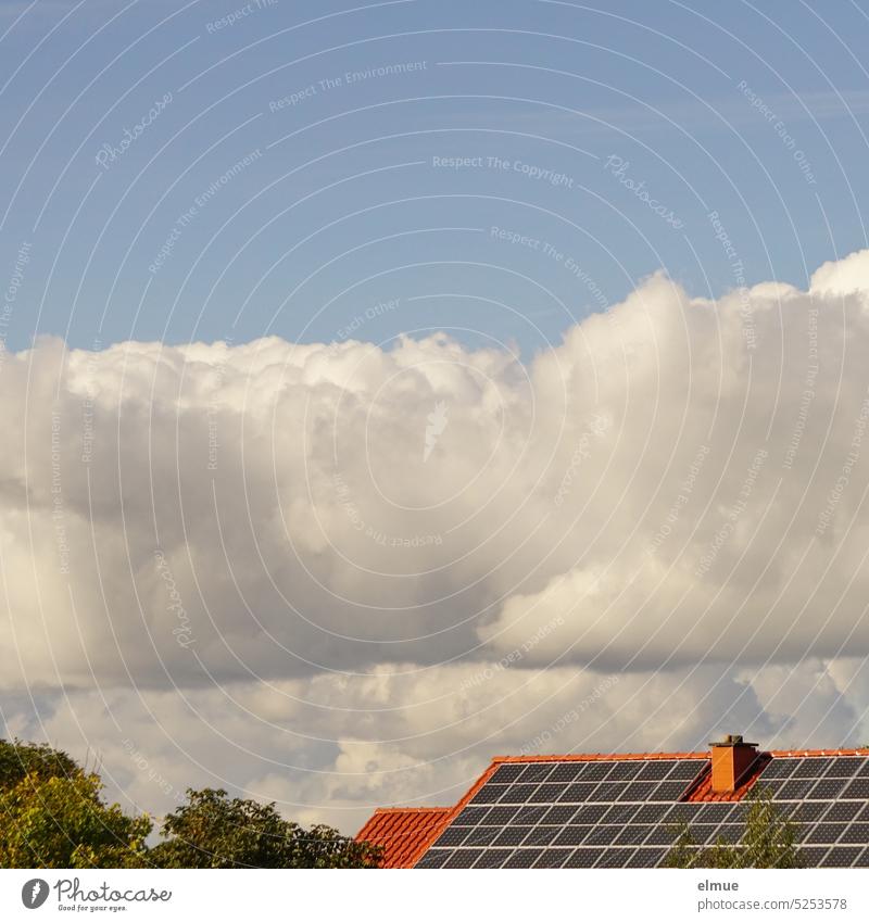 Cloud formation over photovoltaic system on tile roof / solar energy photovoltaics Solar cells Roof Tiled roof dwell Roofing tile Apartment Building Solar Power