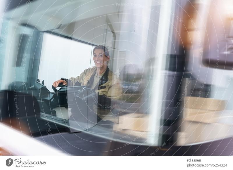 female delivery driver driving van with parcels on seat outside a warehouse on the road with motion blur speed logistics transportation warehousing truck box