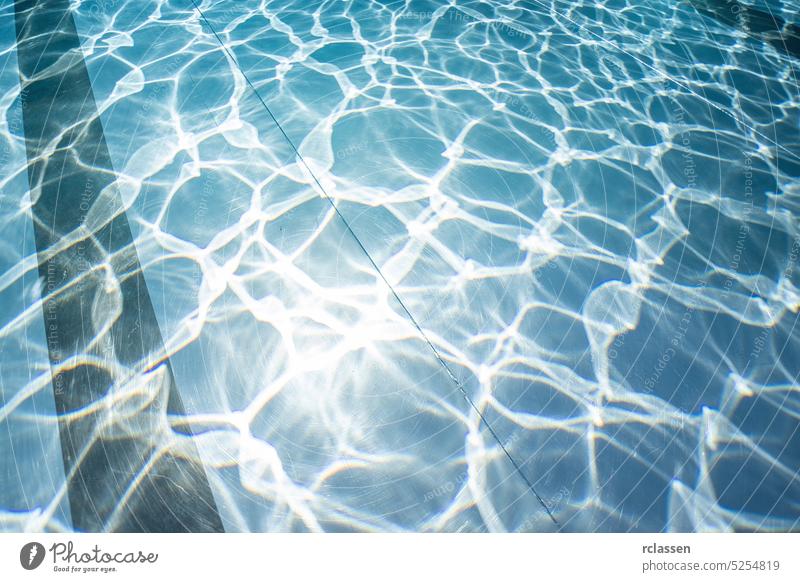 Blue ripped water in swimming pool texture background surface light wave reflection sea underwater blue bright pattern abstract tropical aqua clear fresh pure