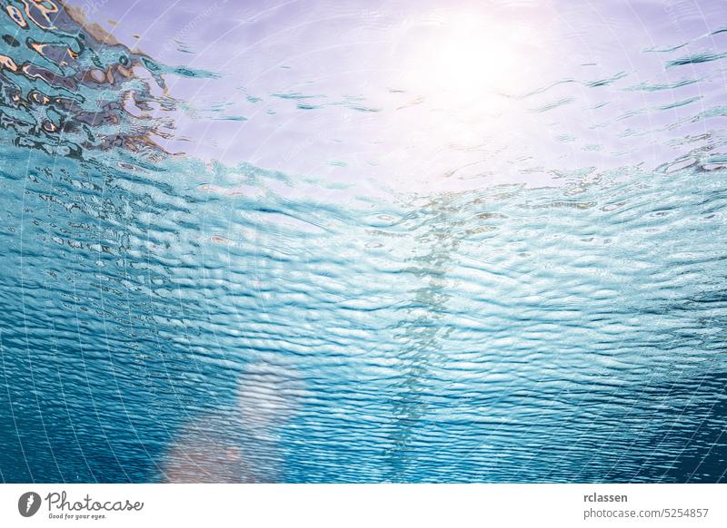 swimming pool under water view to sunlight wellness spa background surface wave reflection sea underwater blue pattern tropical aqua fresh pure summer nature