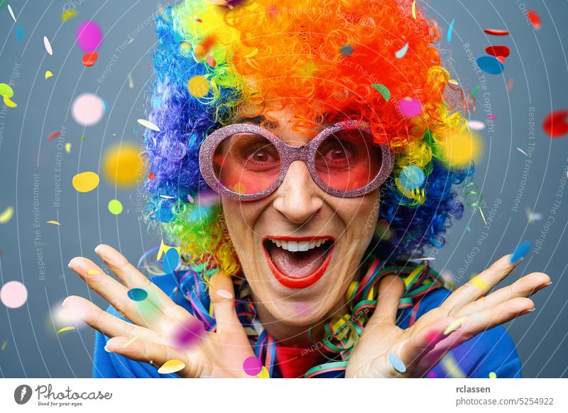 happy party woman Rose Monday celebrating German Fasching Carnival confetti Falling in colorful colors carnival disco parade adult beautiful beauty