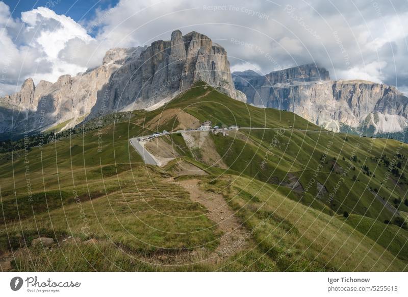Sella Towers - Torri Del Sella, three towers well known for rock climbers, Dolomites, Italy sella dolomites italy torri del sella summer scenic meadow travel