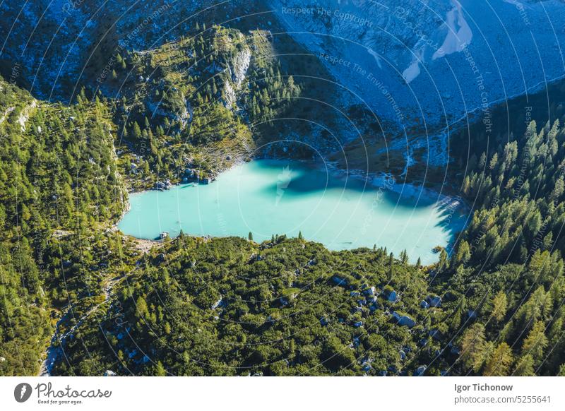 Aerial view of turquoise mountain Sorapiss lake in Dolomites, Italy dolomites italy aerial sorapiss summer scenic travel outdoor landscape water blue tourism
