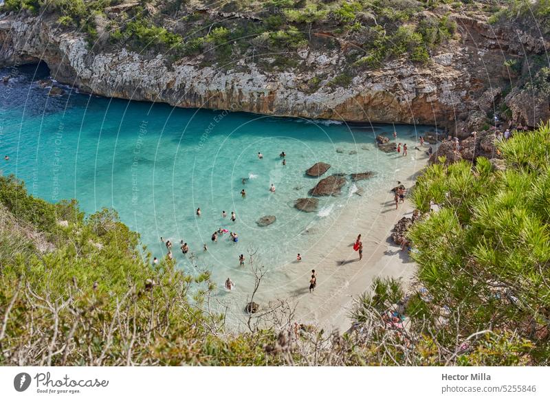 Cala des Moro beach in Mallorca in the summer with many people on the beach Beach Sand Beach dune Desert Exterior shot Landscape Vacation & Travel Nature