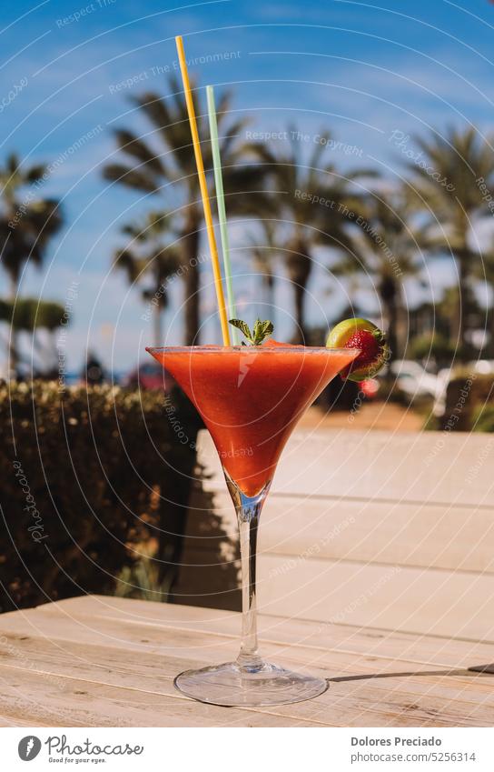 A strawberry daiquiri is a delicious cocktail made with rum, lime juice, sugar, and fresh strawberries alcohol alcoholic background bar beach beverage classic