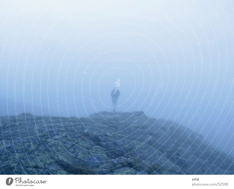 Mountain world without mountain Mountaineering Loneliness Fog Morning Gray Blur Mystic Man Autumn Calm Backpack Disorientated Rock Blue Perspective Escape