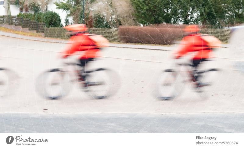 Two cyclists in a hurry -motion blur Cycling Street Exterior shot Leisure and hobbies Healthy Bicycle Sports Lifestyle Transport Cycle Means of transport City