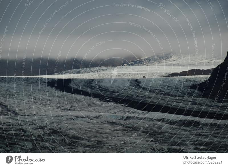 Iceland | flowing glacial ice in the form of Saturn rings Glacier Glacier ice Glacial melt Frost Cold Mountain Climate change fluid Glacier tongue Melt Gray
