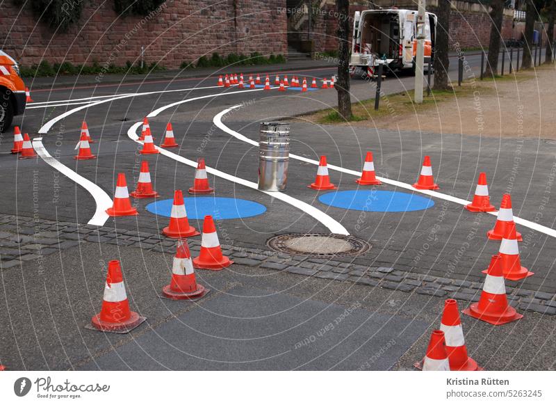 marking work with traffic cones marking works Cycle path cycle path Lane markings Traffic lane Pylons guiding cone Traffic cone muster paint on