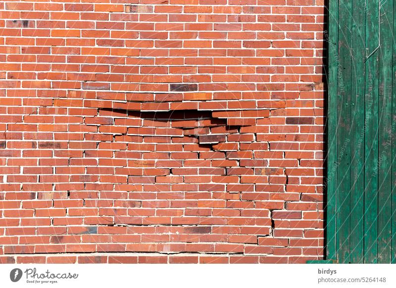 Driving error, dented brick wall Dented Brick wall Broken driving error Accident unstable Bricks hit sb./sth. Accidental damage house wall Barn door