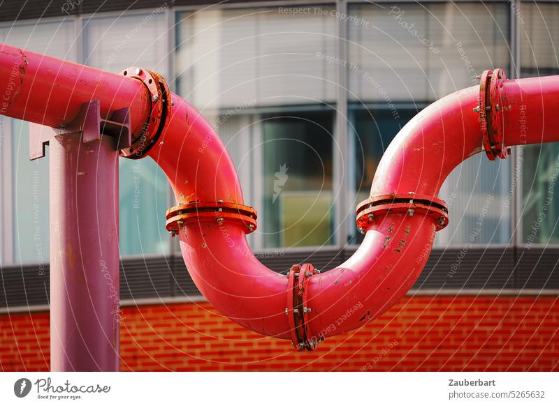 Berlin water pipe in pink red forms a U in front of glass facade conduit Water pipe Construction site drainage U-shaped Curve screwed street scene Conduit