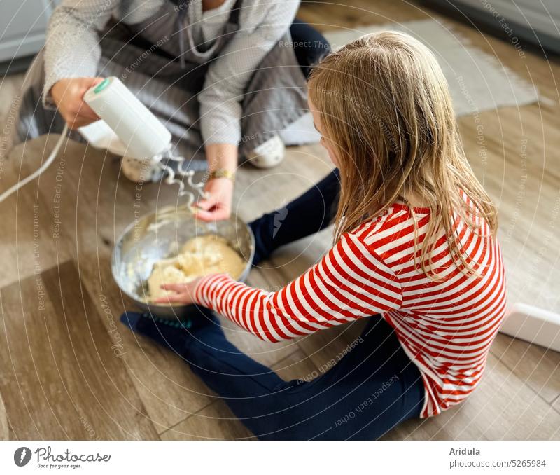 Woman and child kneading dough with mixer on kitchen floor Baking Bread Cake Kitchen Mother mama Child Dough Flour Ingredients Apron Infancy Cooking Food Yeast