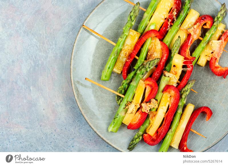 BBQ grilled vegetables on skewers, space for text. asparagus cheese colorful stick shashlik kebab diet pepper green flat lay top view barbecue roasted meat free