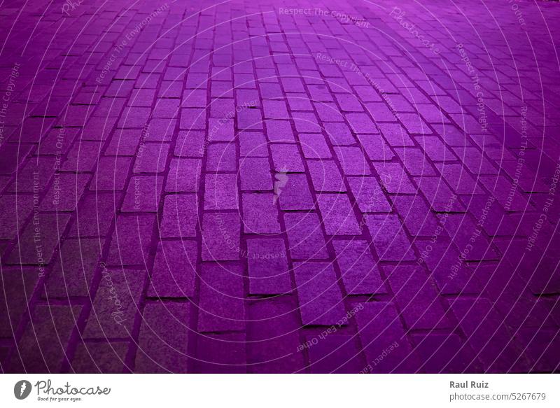 Background. Rectangular cobblestone street with purple light. backgrounds horizontal no people photography arrangement color image 2015 full frame germany rough