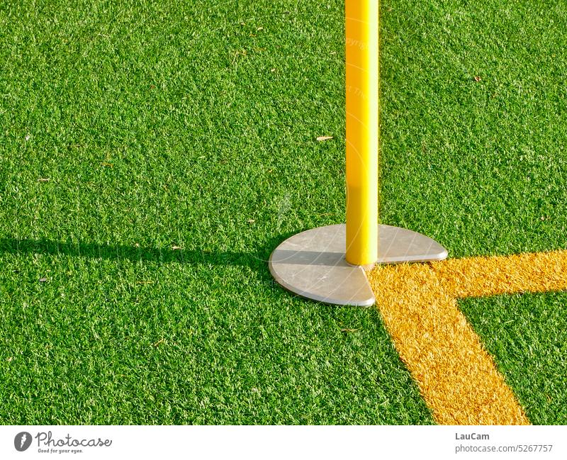 The round has to go into the square - or the square into the round? Foot ball corner flag Sports Playing field mark lines Corner Sharp-edged Round Green
