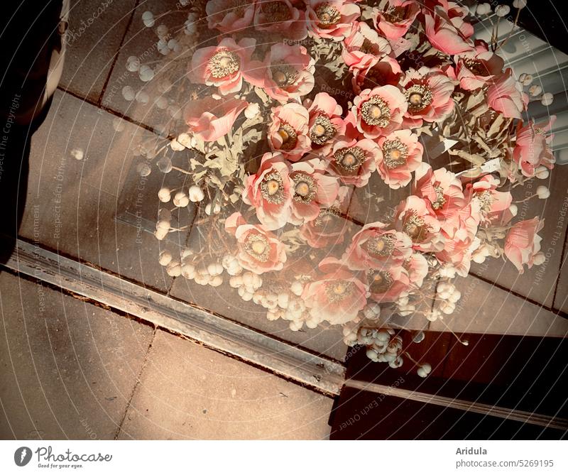 Artificial flowers in shop window No. 1 Dried flowers Bouquet Window Glass Shop window faded Old Pink Kitsch dusky pink reflection Paving stone Ground