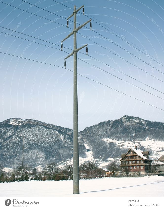 Power_Poles_in_the_snow Electricity Transmission lines Stripe Electricity pylon landscape Idyll Mountain mountains Blue