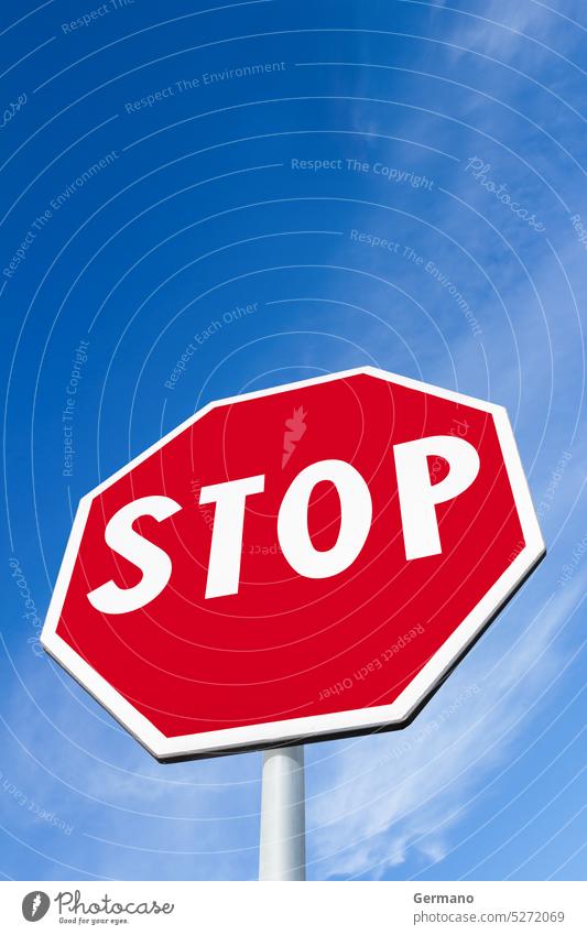 Stop sign against attention background blank blue clear clouds copy drive empty information isolated message metal nobody red road roadside route safety