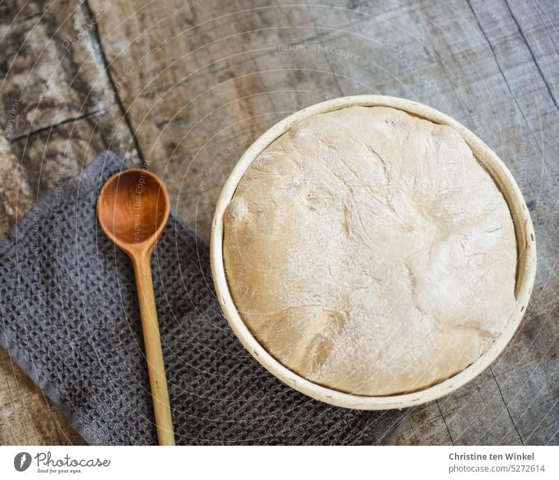 The bread dough has risen nicely in the proofing basket yeast dough sourdough bake bread Bread Baking Food Self-made Living or residing shape Surface Cooking