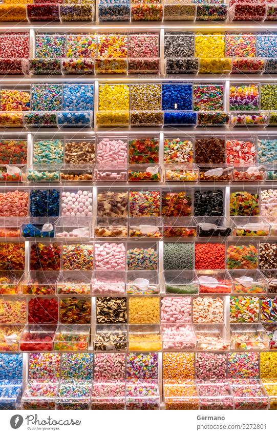 Self service display with many candies assortment background box candy chocolate choice color colorful confectionery container delicious flavor food gummy jelly