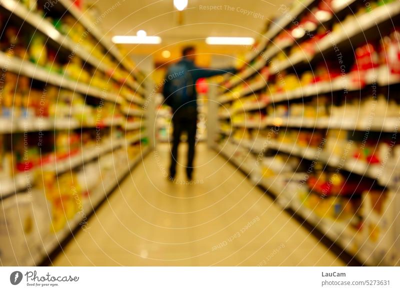 In the supermarket - first compare the prices Supermarket purchasing Shopping Food Offers Prices Shelves Corridor discount Consumption consumer Load