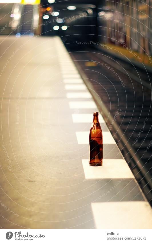 The last train. Withdrawal. Bottle of beer Empty Beer Platform platform edge Underground Commuter trains Alcoholic drinks alcoholism Train station