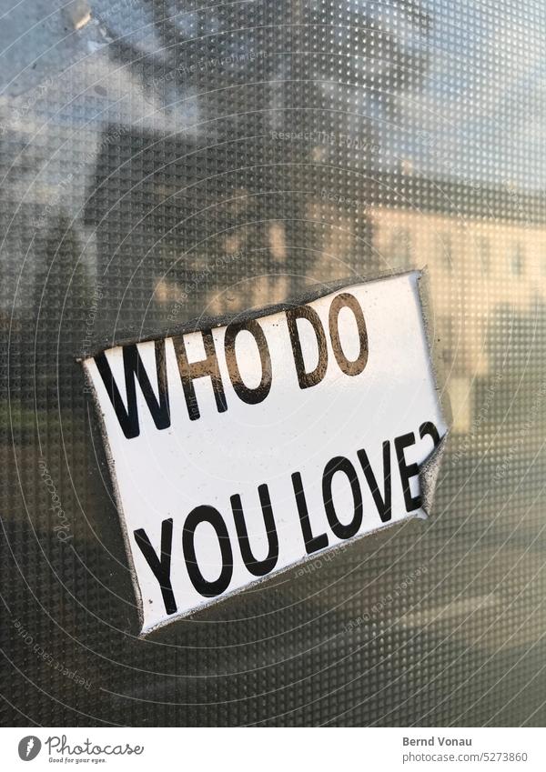 Who do you love? stickers Love question message Passion Pane Window Typography Letters (alphabet) Old worn-out Reflection Building Window pane Glass reflection