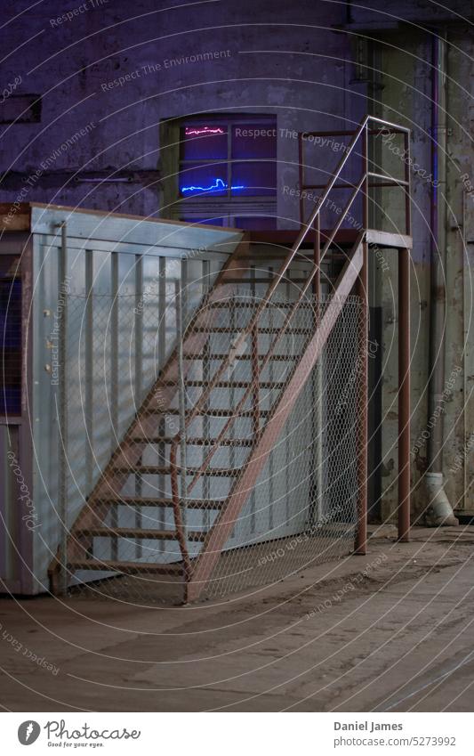 Industrial warehouse staircase with a glimpse of neon light Stairs Warehouse Metal Neon light Deserted Industrial plant Building Factory Manmade structures