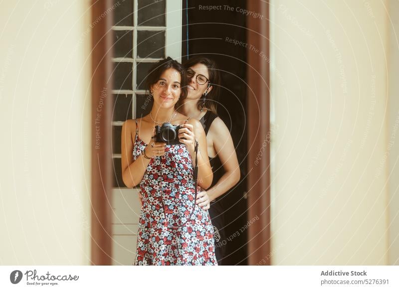 Young couple women taking photo on camera in mirror woman take photo photo camera reflection photography photographer photo shoot moment cuba smile female