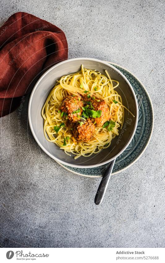 Bowl with pasta and meatballs spaghetti bowl concrete cooked coriander cuisine dinner food italian meal minimalism sauce stone tomato lunch delicious dish table