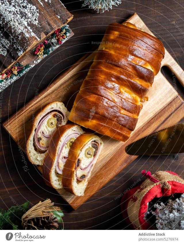Appetizing ham bread on cutting board baked delicious fresh food loaf tasty cuisine table baguette meal gourmet nutrition chopping board homemade tradition