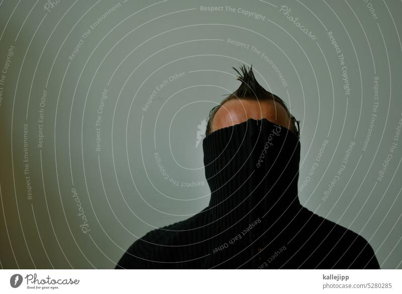 pointed cap Hair and hairstyles Roll-necked sweater Concealed Hide Problem depression portrait Human being Colour photo Anonymous Adults Mask Face Studio shot