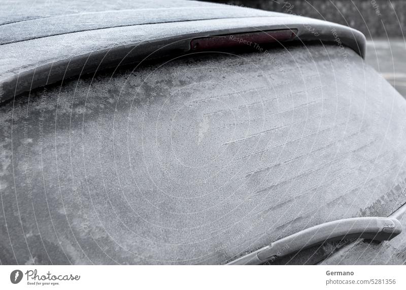 Frozen car auto automobile back background beautiful black blizzard climate closeup cold covered frost frosty frozen glass ice icy light nature outdoors rear