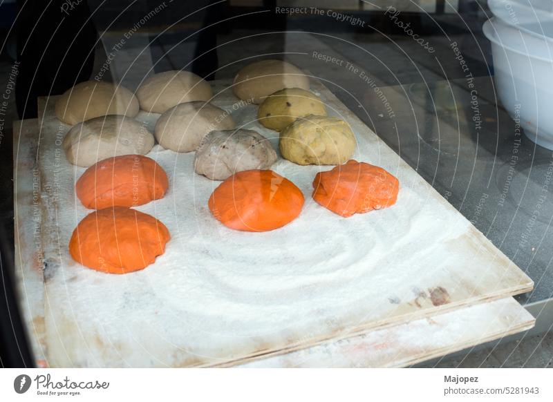 Raw bread pieces on a tray. cooking tasty closeup egg yellow breakfast fresh background white assorted baker bakery business caucasian close up copy space daily