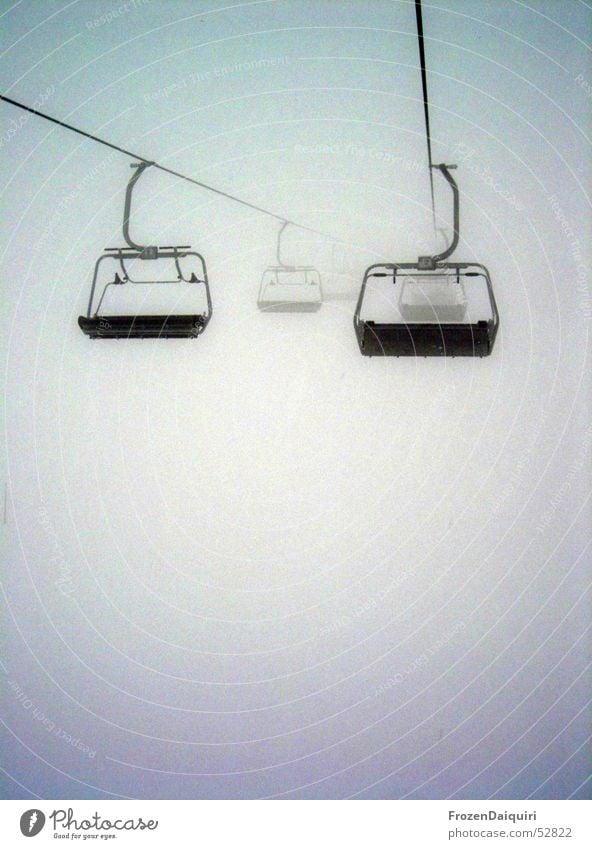 Chair lift to nowhere Fog Dark Ambiguous Hang Dependence Westendorf Federal State of Tyrol Winter Freeze Cold Damp Wire cable Bright Contrast Fear Empty nothing