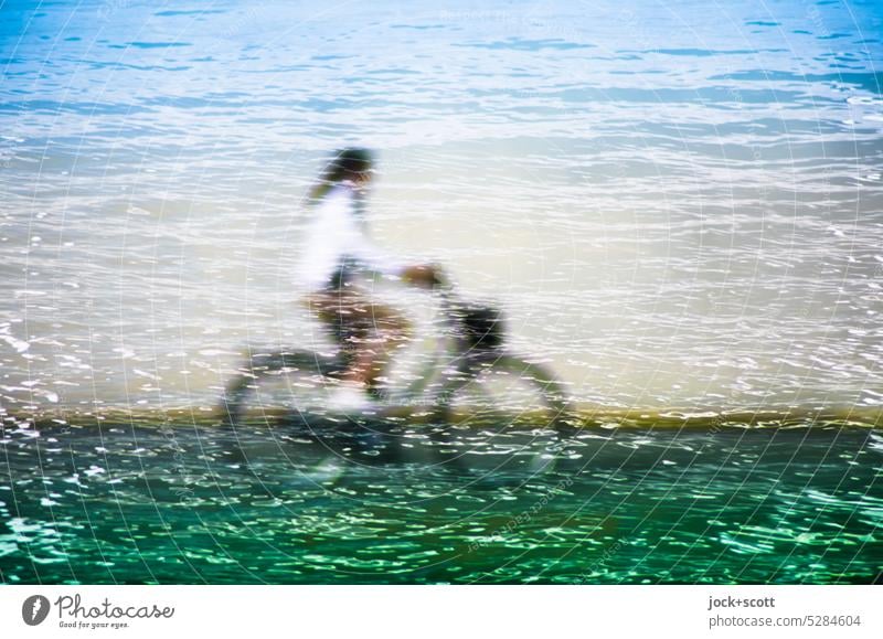 Dream of riding a bike Bicycle Driving Mobility Eco-friendly Means of transport Lanes & trails In transit Leisure and hobbies Surface of water blurriness