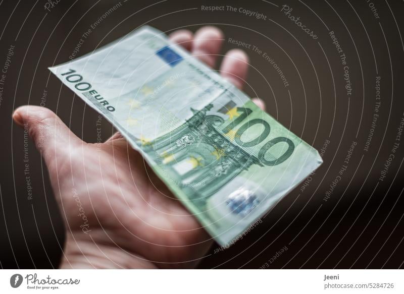 Money in hand 100 hundred Euro Luxury Loose change Income finance Rich Success Business Save Shopping Economy concept Financial Industry investment profit