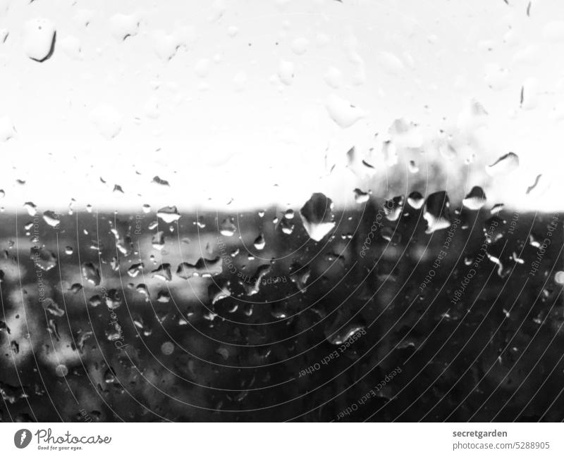 Time for tea, sofa and a good book. Rain Slice Black & white photo Minimalistic cloudy Moody Horizon Drops of water Wet Rainy weather Weather Winter Bad weather