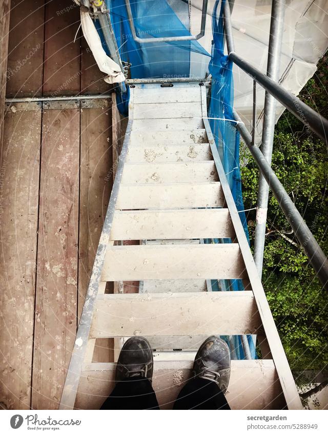 downtrend Construction site feet Footwear Stairs Downward Downward trend Colour photo Exterior shot Banister Subdued colour Architecture Descent Build